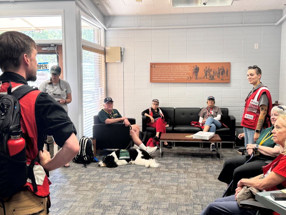 Group of people sitting in the lobby of a building