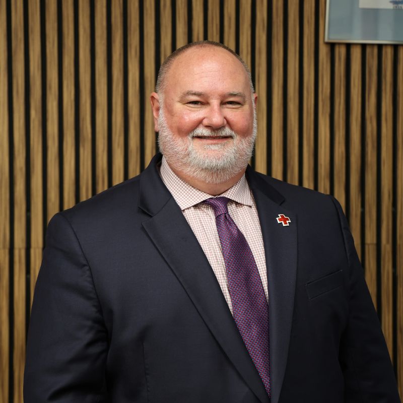 Headshot of James Wilcox.