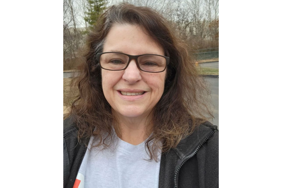 Selfie of woman in Red Cross shirt 