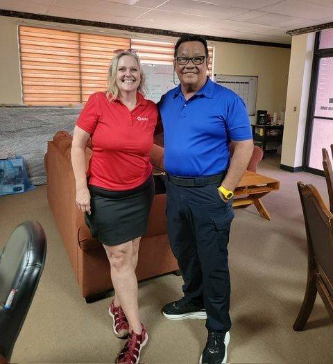 Lori stands next to mayor