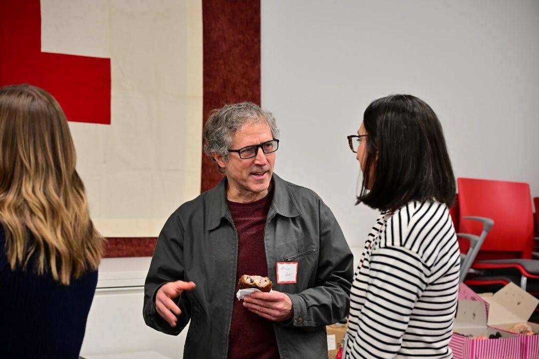 Michael talks with woman inside blood donation center