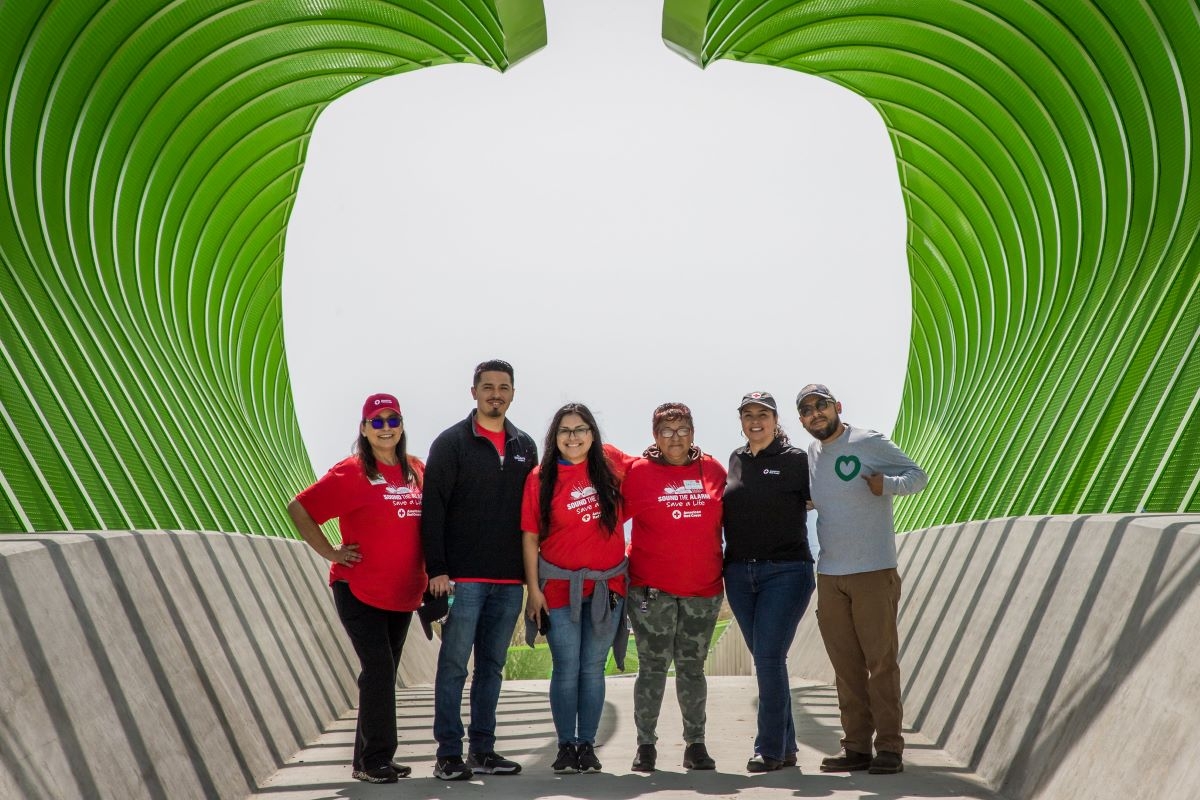 Red Cross volunteers helping residents with emergency escape route.