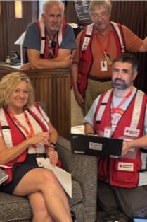 Group of Red Cross volunteers work together on deployment