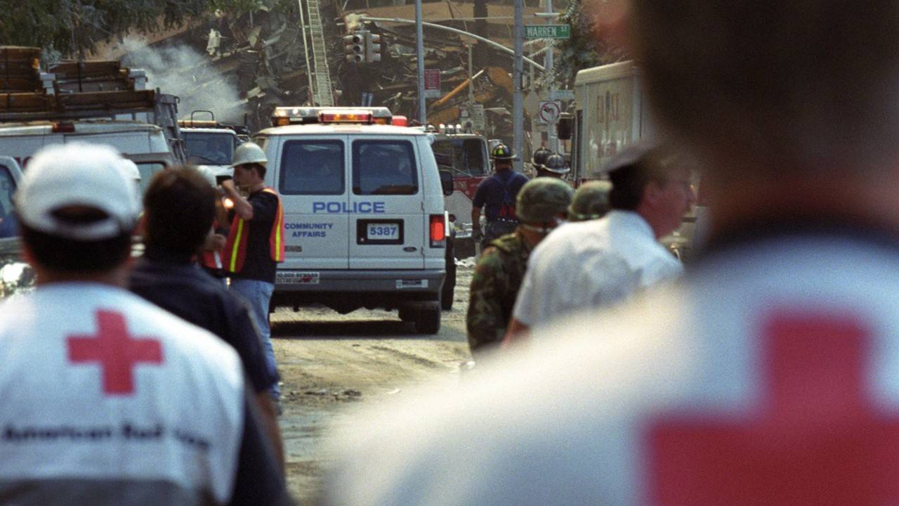 disaster volunteer viewing collapsed building