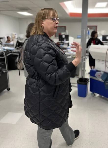 Woman walks through blood donation center