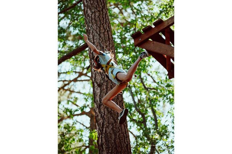 Youth on zipline