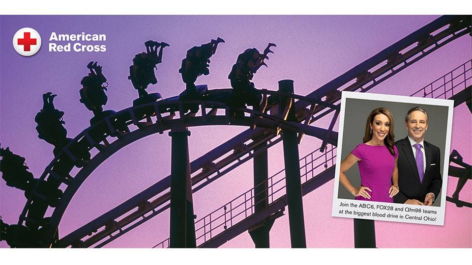 News anchors with rollercoaster silhouette in background