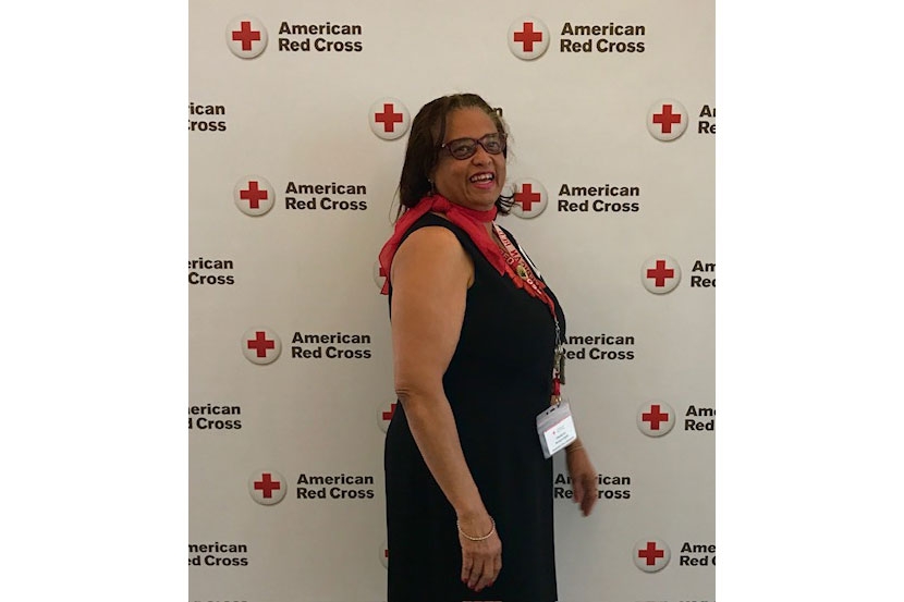Fran McIntyre-Smith in a formal dress at a Red Cross event.