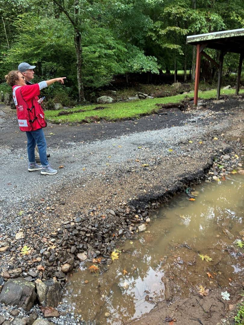 Red Cross volunteers survey damage to homes after flooding