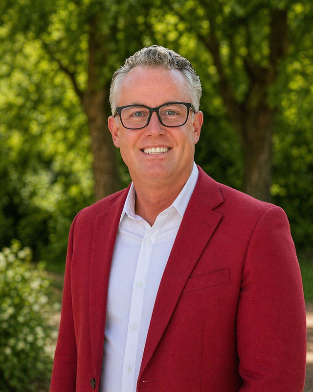 Headshot of John McKinnon