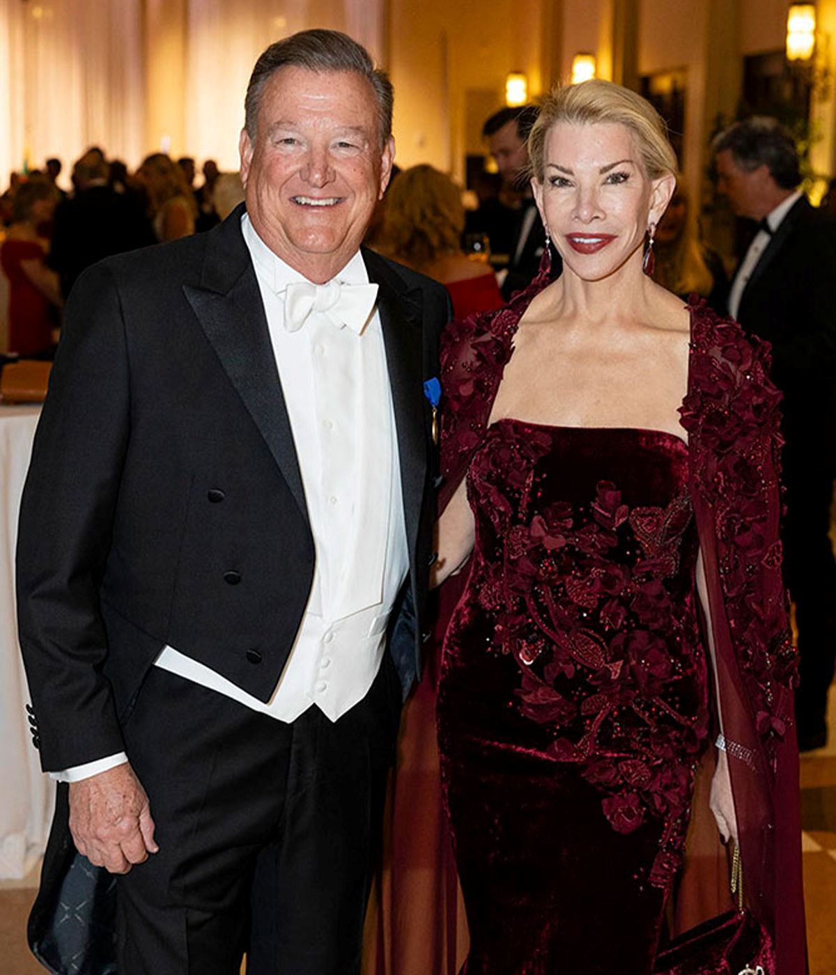 Charles and Amanda Schumacher in formal wear at the 64th International Red Cross Ball.