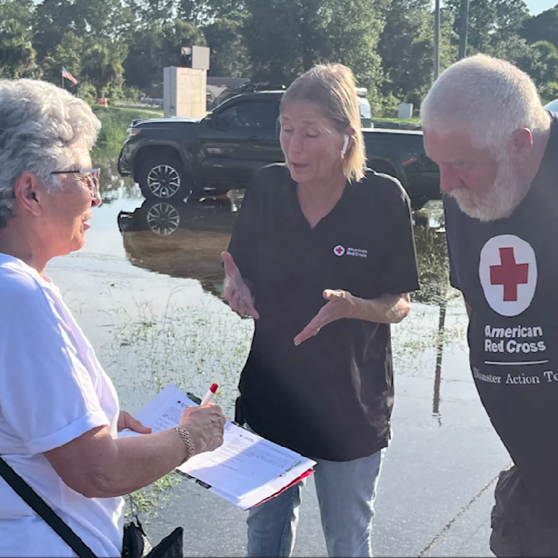 woman talking with another woman