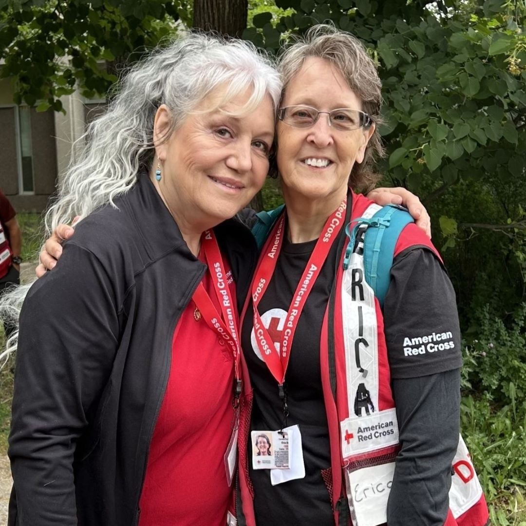 two women with arms wrapped around each other