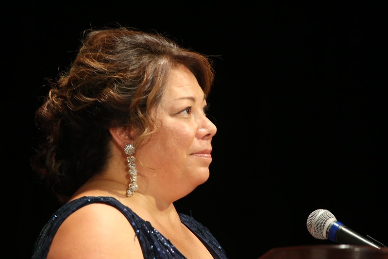 wendy wilber speaking at podium