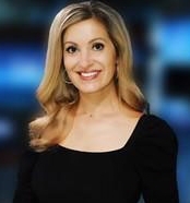 woman standing in black dress