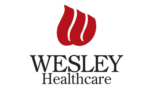 Wesley Medical Center logo.