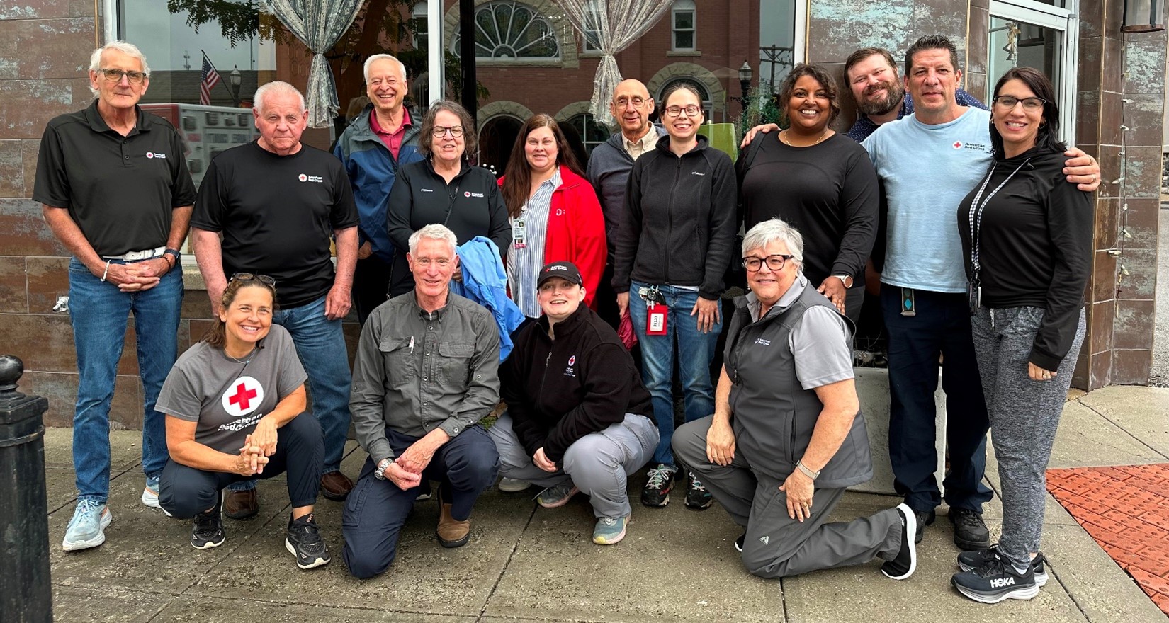 group of red cross volunteers in a group photo
