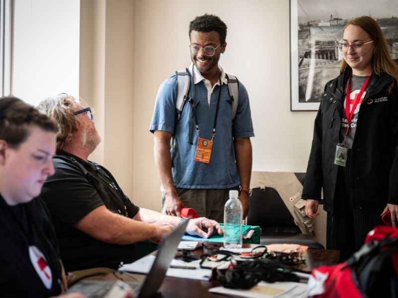volunteers conversing in office