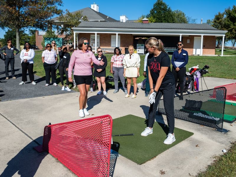 group of women playing golf