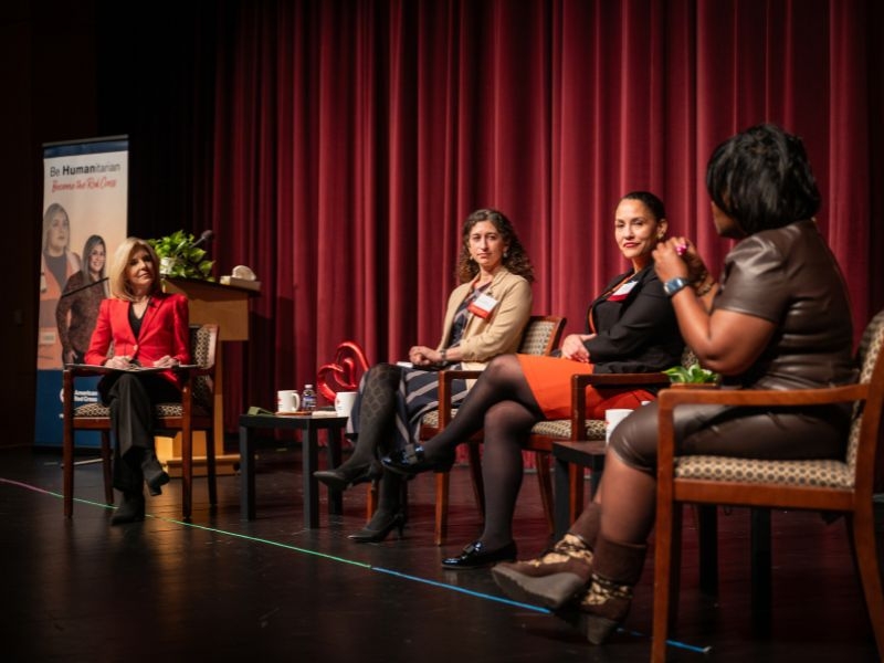 women speaking during panel discussion