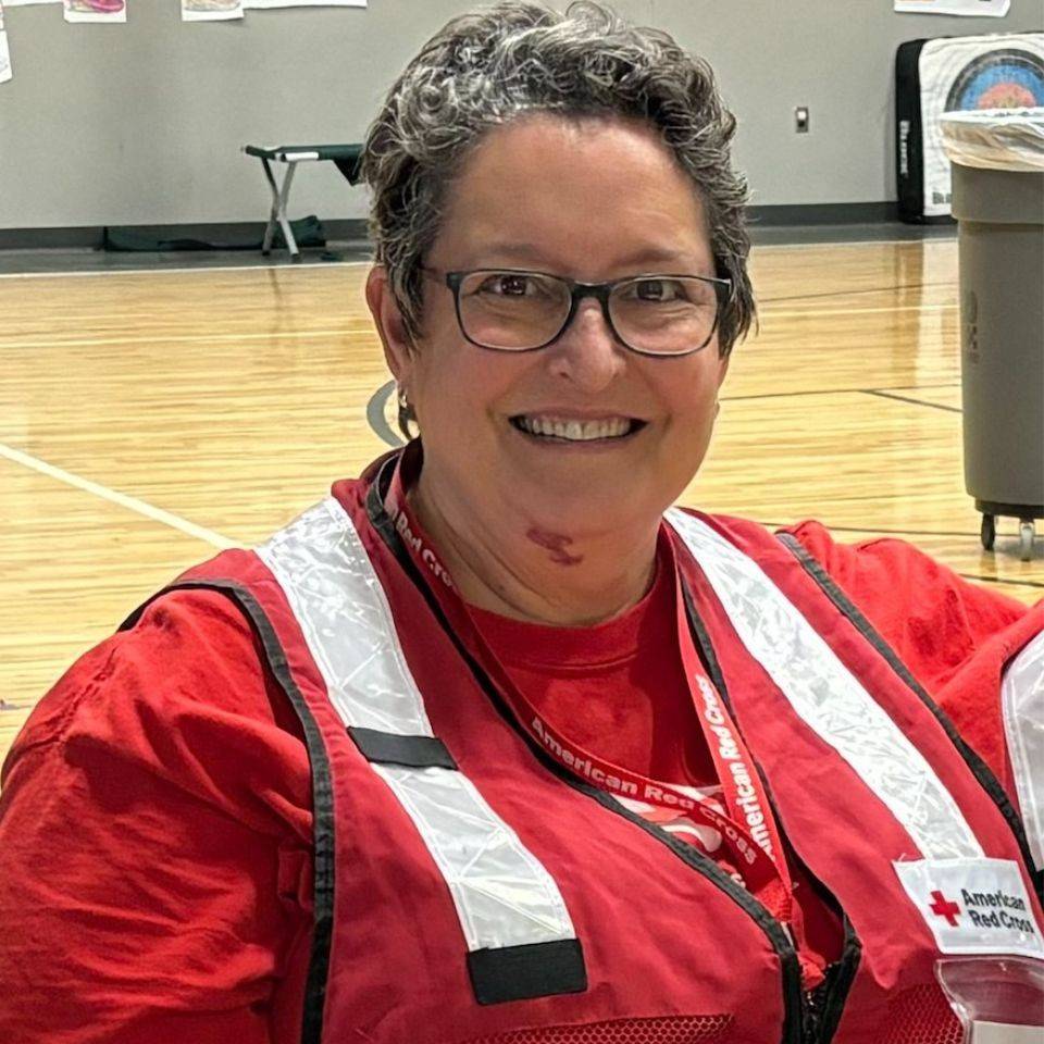 eunice in red cross volunteer uniform