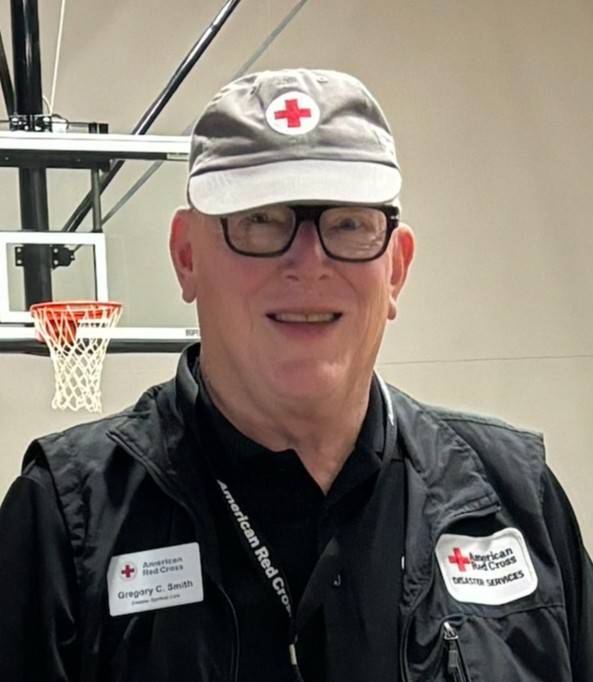 greg smith in red cross hat
