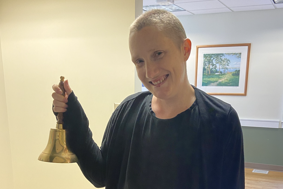 Woman rings bell after cancer treatments
