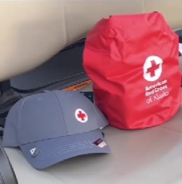 Blue Hat, Red Cross Bag
