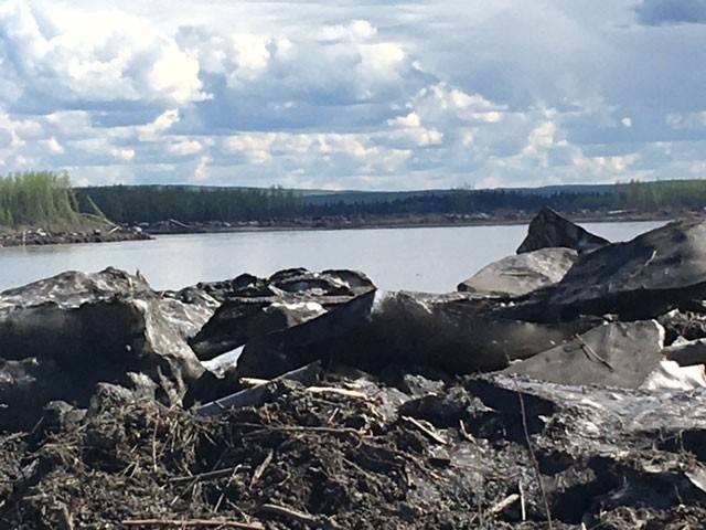 Flooding in Yukon with mountains in background