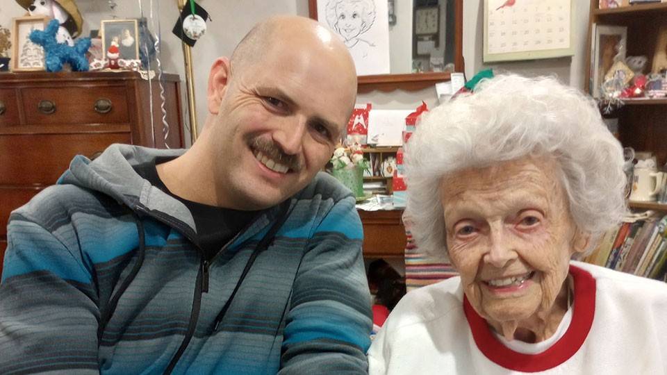 Sgt. Patrick Demers sitting next to his nearly 104-year-old grandmother, Luella Demers.