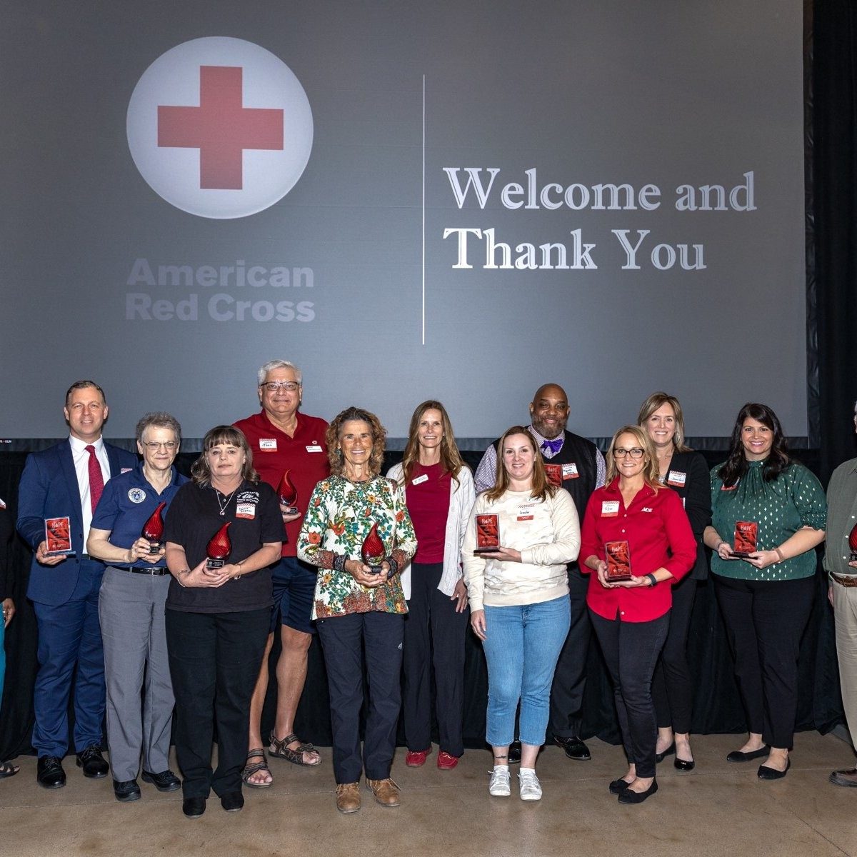 group of people with awards