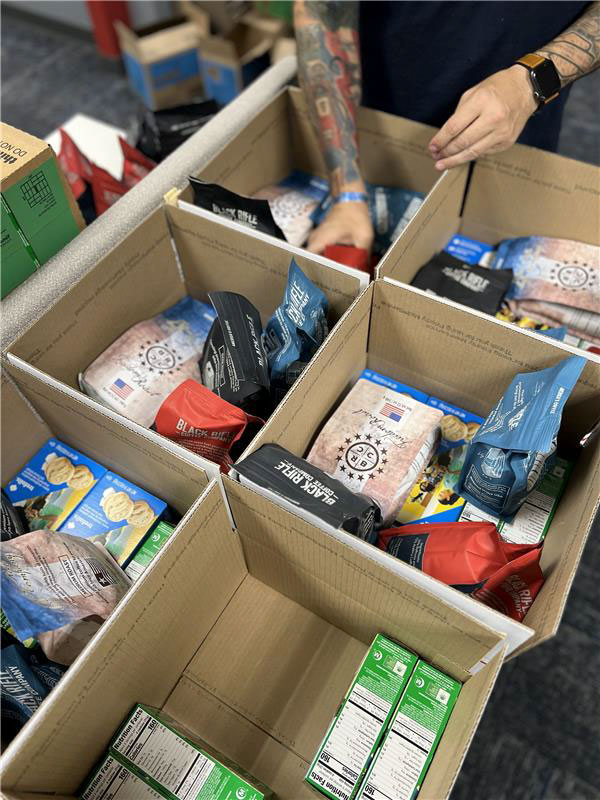 Red Cross compiled packages with Girl Scout Cookies and Black Rife Coffee.