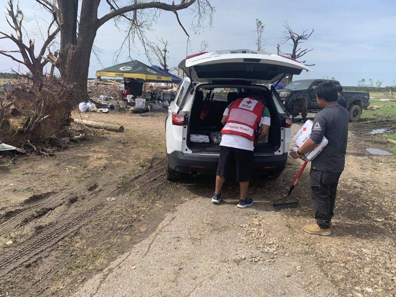 volunteer unloading vehicle