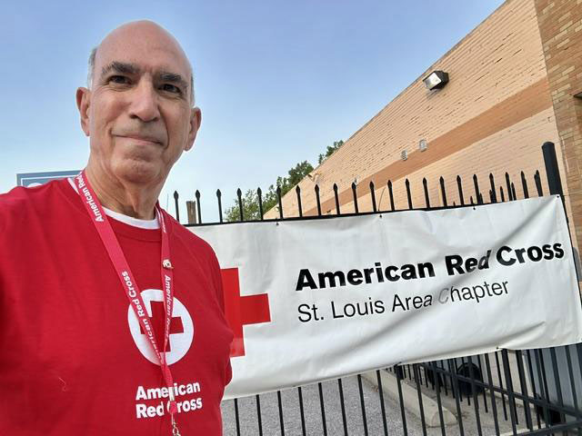 Kevin Koontz wearing a Red Cross shirt.
