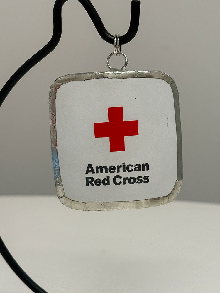 an American Red Cross pendant.
