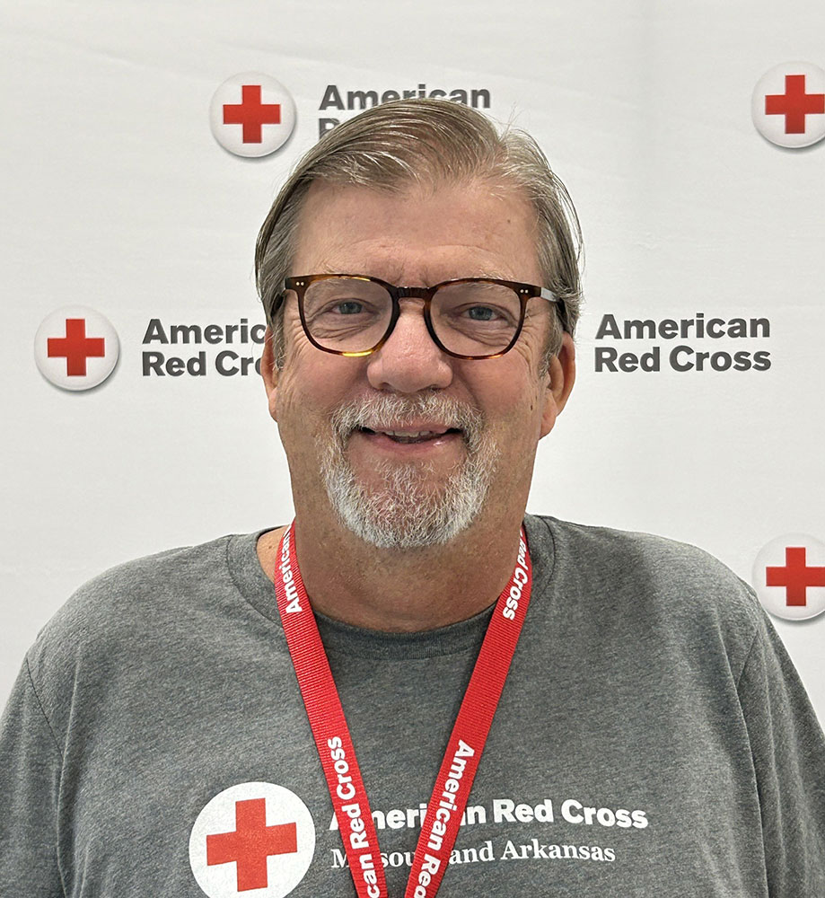 headshot of volunteer Mike McGowan in a Red Cross shirt.