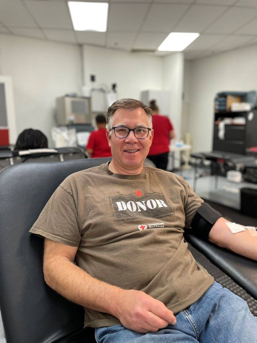 Richard Alport giving blood