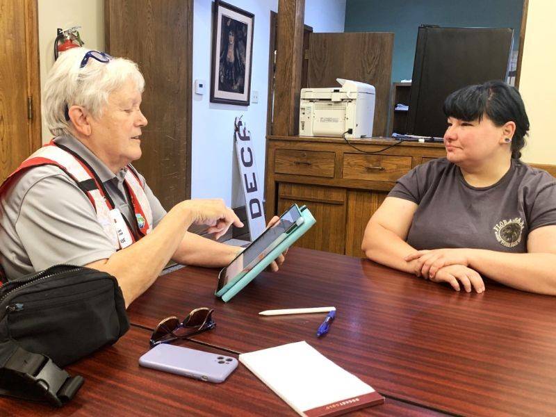 patsy speaking with red cross volunteer