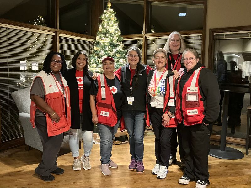 terri and sandra rodriguez with group of other red cross volunteers