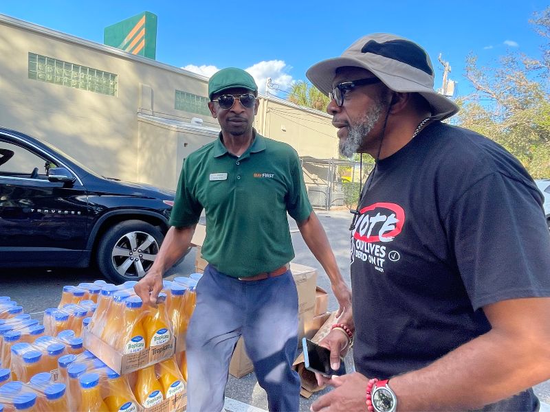 Carlos Yancy standing with Trevor Harvey, Sarasota NAACP