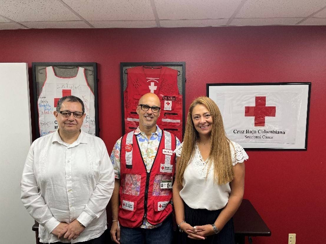 three red crossers posing