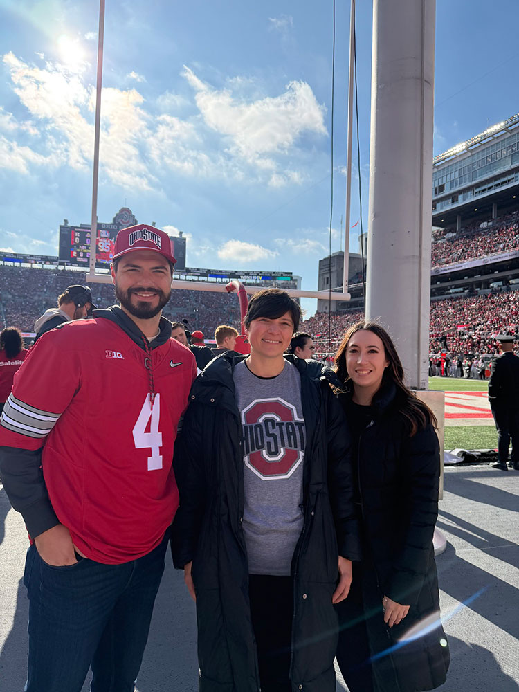Colby Morris, Stasia Levakis and Gita Balakirsky group photo at the Ohio State Football game.