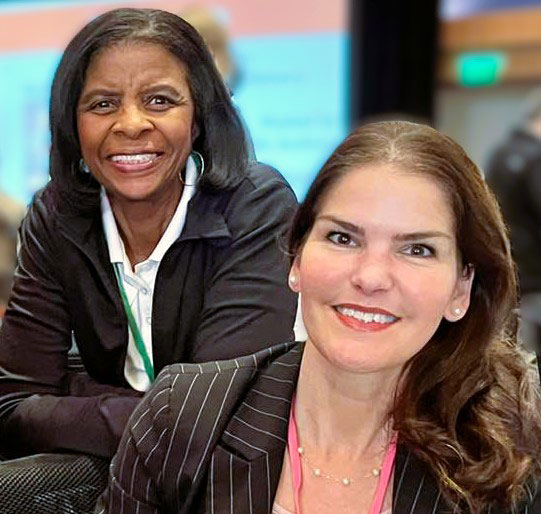 Janice Winston and Emily Fortman in office attire.