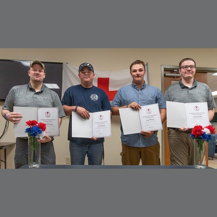 Four Chillicothe firefighters holding certificates.