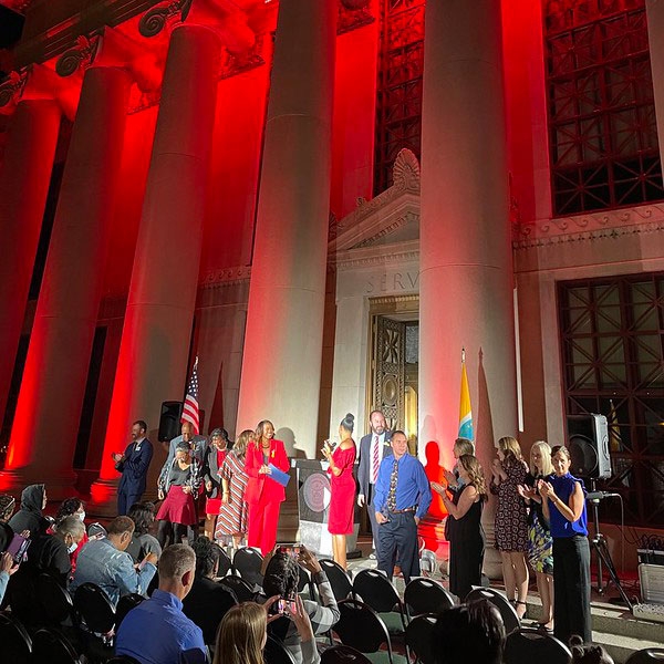 Columbus chapter Executive Director Cory Paul joined local leaders to light up city hall.