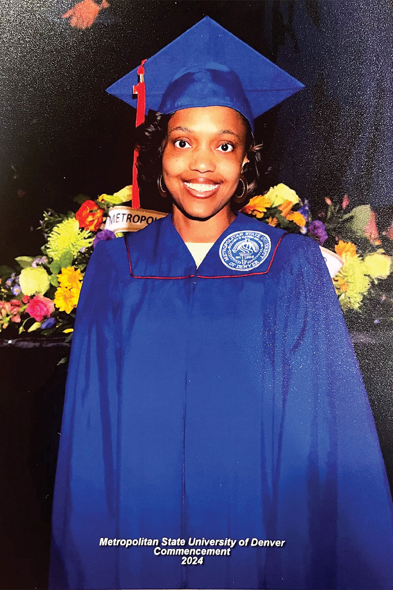 Jasmine Davis wearing graduation cap and gown.