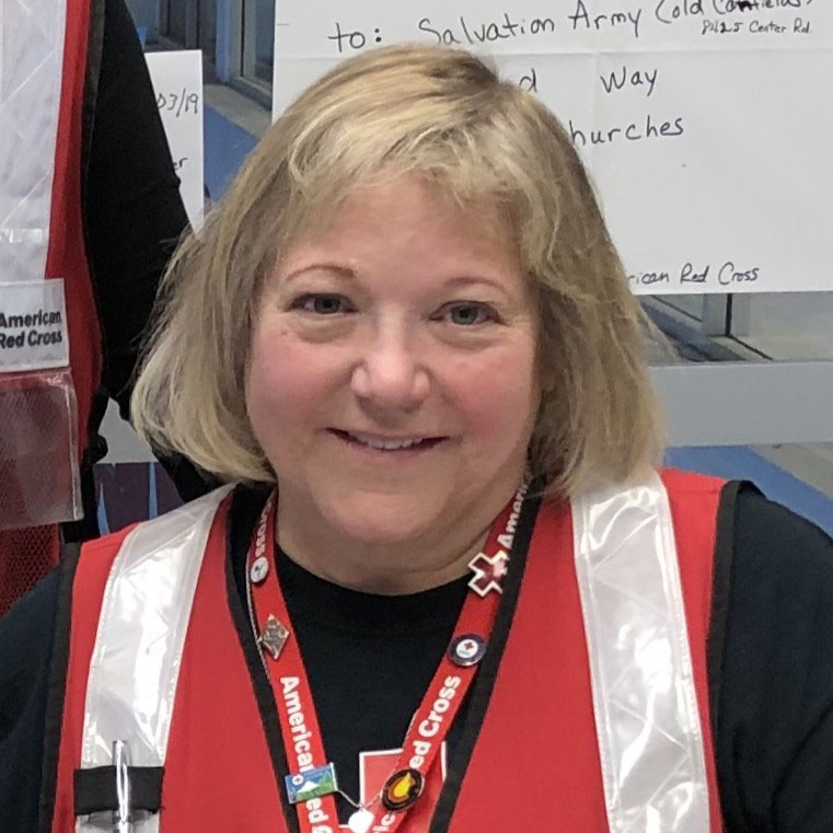Thea Wasche wearing Red Cross vest.