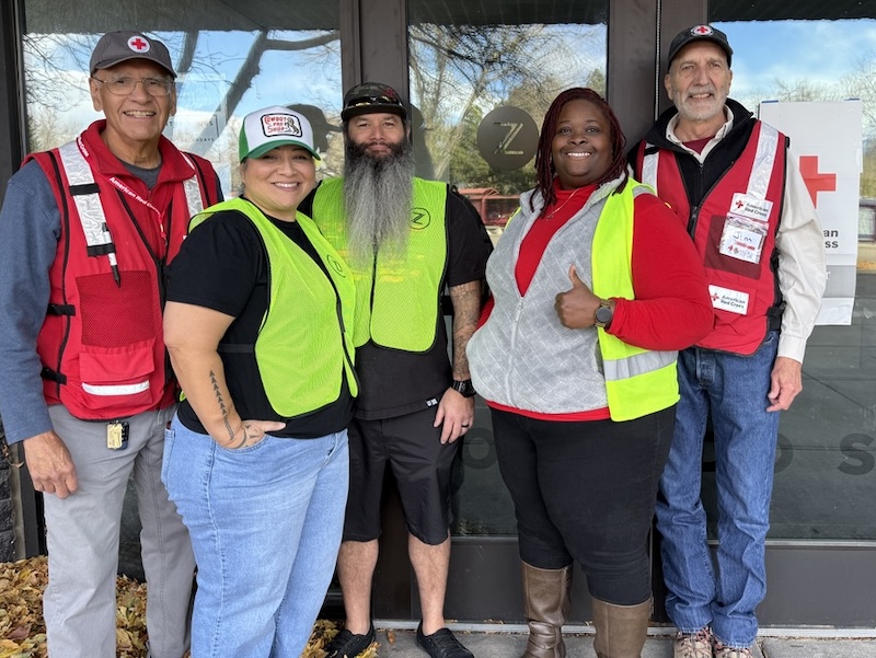People standing in front of a church