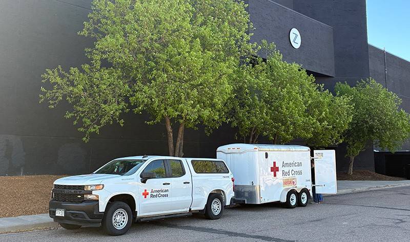 A Red Cross truck and trailer parked in front of Zeal Church in Colorado Springs