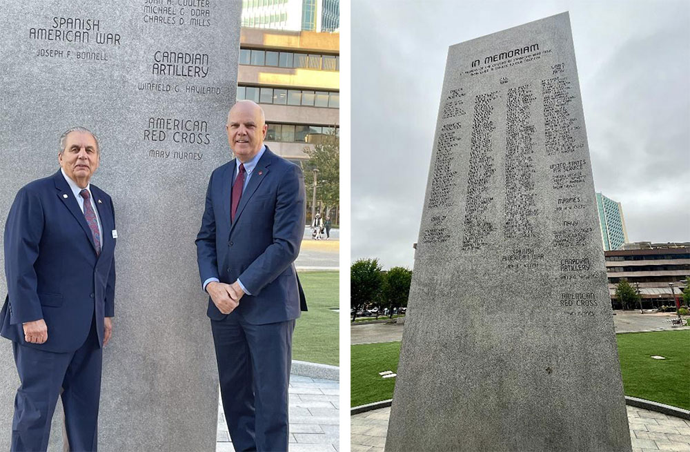 Lucian Terranova, Red Cross Connecticut Board Member, and Richard Branigan, CEO of the Red Cross Connecticut and Rhode Island Region, stand beside the engraving of Mary Nurney on the Memorial Monolith at Stamford Veterans Memorial Park.